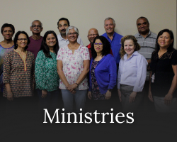 Smiling members of the parish community at St. Isaac Jogues Parish